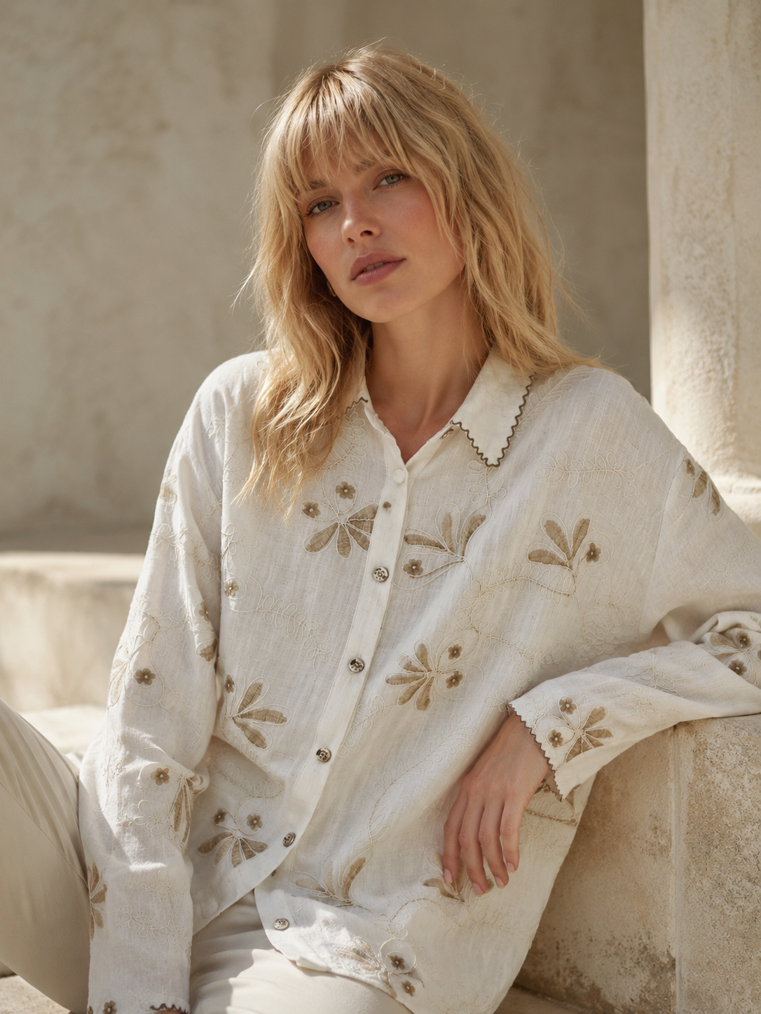 Ecru embroidered cotton shirt with floral motifs