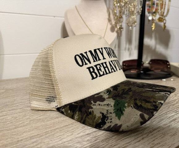 on worst behavior trucker hat with cow print